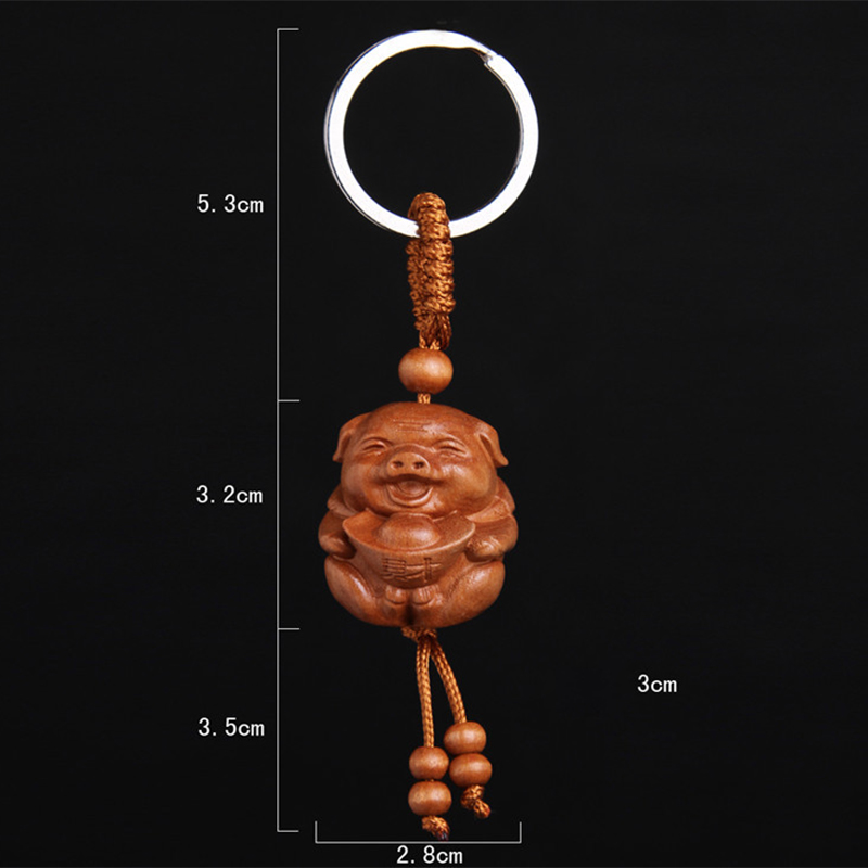 Móc khóa gỗ heo thần tài Móc khóa gỗ heo thần tài