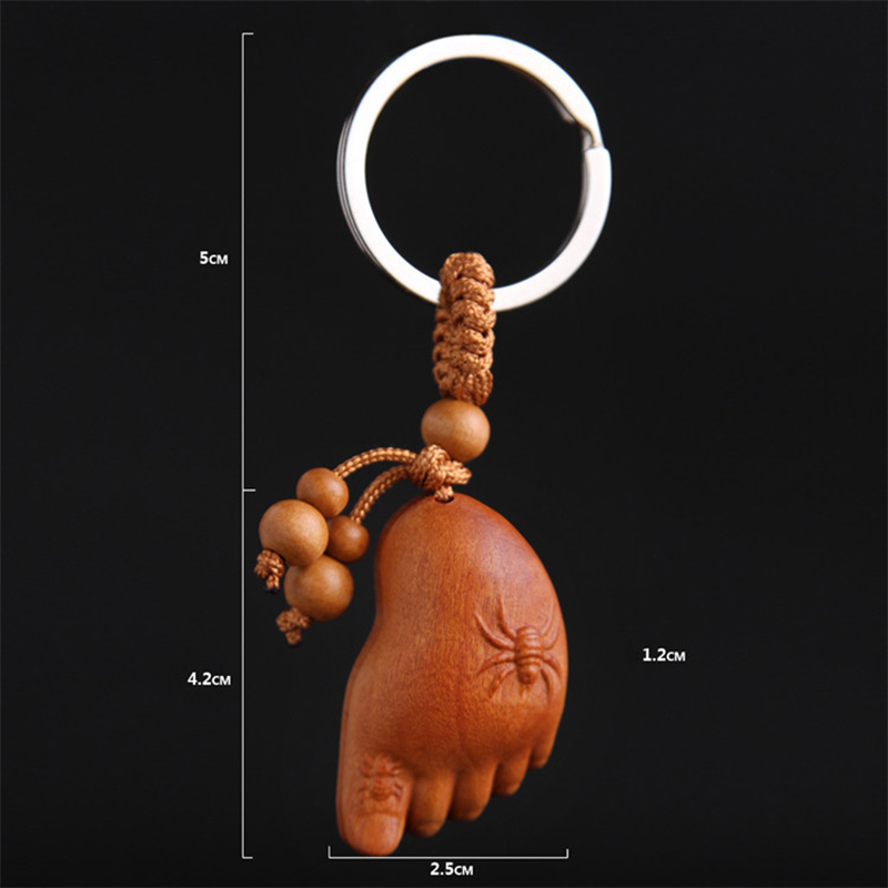 Móc khóa gỗ khắc hình bàn chân Phật Móc khóa gỗ khắc hình bàn chân Phật