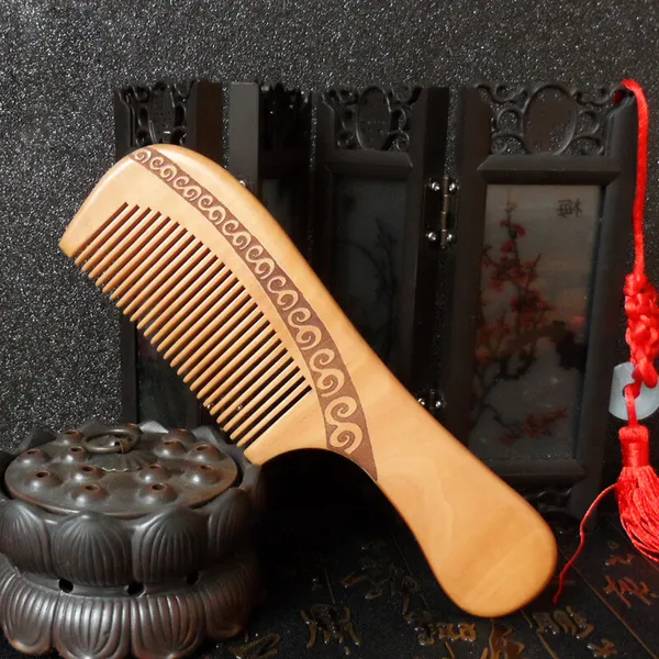 Lược gỗ đào tự nhiên chống rụng tóc
