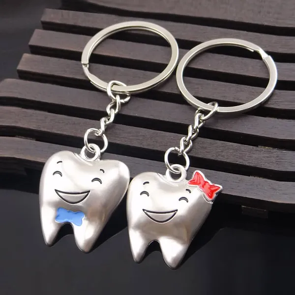 Móc chìa khóa đôi hình cái răng