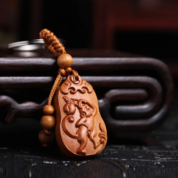 Móc chìa khóa gỗ con khỉ