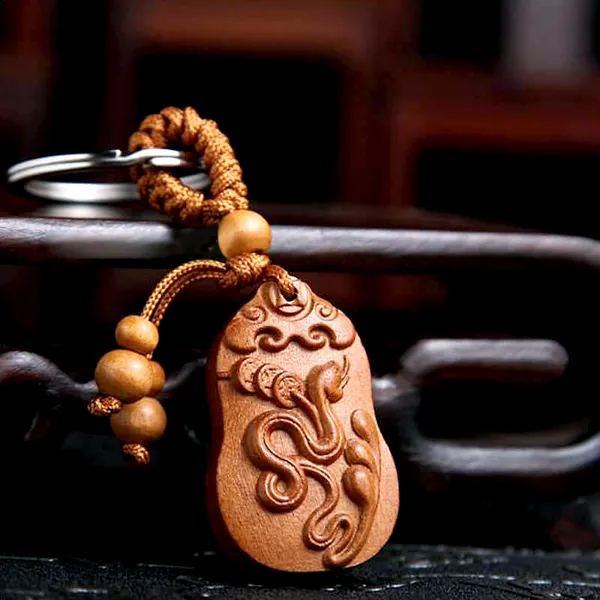 Móc chìa khóa gỗ con rắn