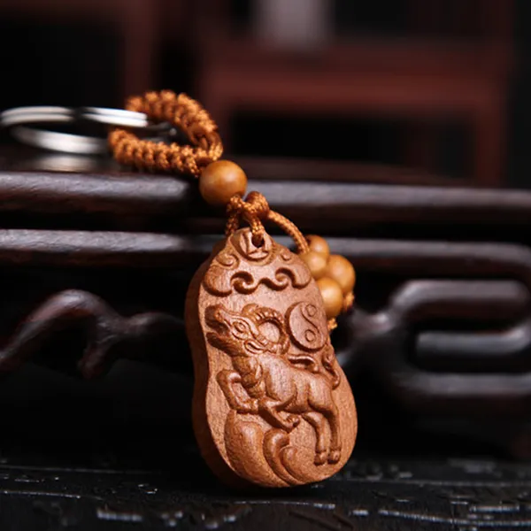 Móc chìa khóa gỗ con trâu