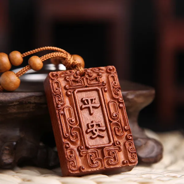 Móc khóa gỗ hình bùa bình an