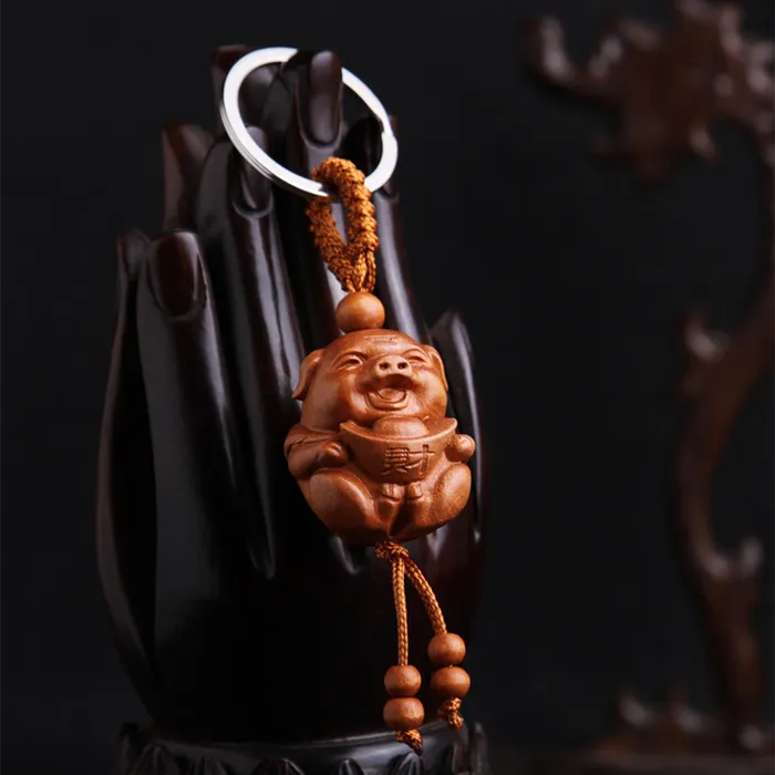 Móc chìa khóa gỗ heo thần tài