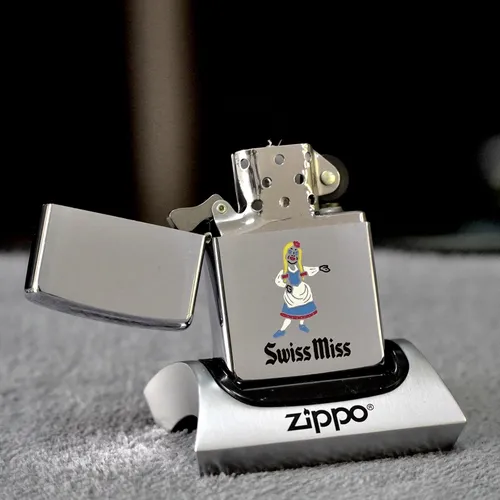 ZIPPO XƯA 1972 - HÀNG XƯA THẬP NIÊN 70s _CHỦ ĐỀ SWISSMISS CÔ GÁI CÔNG HOA KỲ