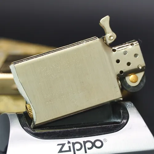 ZIPPO XƯA SLIM GOLD PLATED 1976 - HÀNG XƯA THẬP NIÊN 70s _ CHỦ ĐỀ DIAGONAL SWIRL