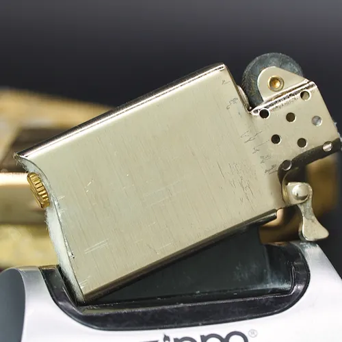 ZIPPO XƯA SLIM GOLD PLATED 1976 - HÀNG XƯA THẬP NIÊN 70s _ CHỦ ĐỀ DIAGONAL SWIRL