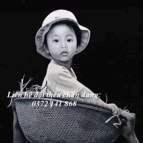 Tranh thêu chân dung em bé trai tphcm