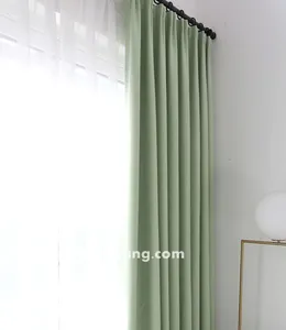 Vài rèm cửa màu xanh ngọc nhạt