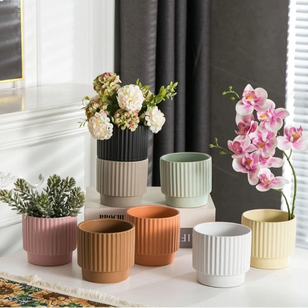 Khu vườn mini hoàn hảo với chậu trồng cây nhiều tầng, tạo không gian xanh đa chiều cho căn hộ chung cư hiện đại. Khu vườn mini hoàn hảo với chậu trồng cây nhiều tầng, tạo không gian xanh đa chiều cho căn hộ chung cư hiện đại.