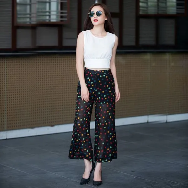 Quần đen chấm bi màu