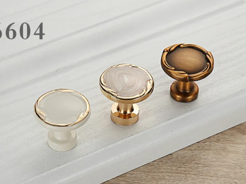 Tay nắm tủ  tròn 6604