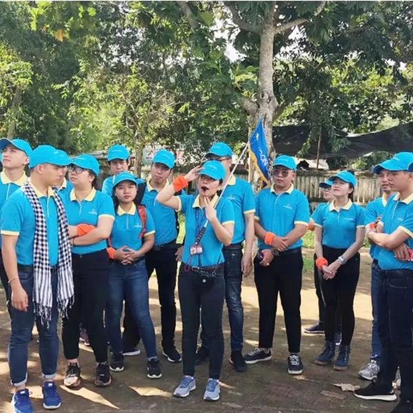 Áo thun đồng phục du lịch Saigontourist màu xanh phối cổ vàng