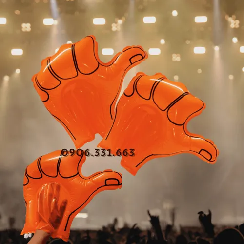 Xu hướng bóng đập cổ vũ bàn tay màu cam tại sự kiện 2025–2026