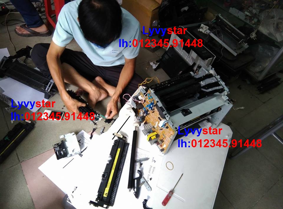 ve-sinh-may-in-thay-drum-tai-quan-tan-binh