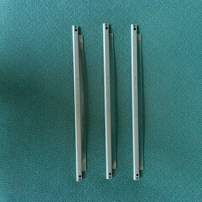 gạt từ máy in canin 2900