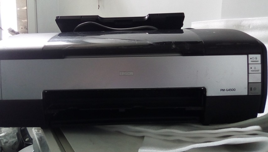 may i epson G4500 hang nhat