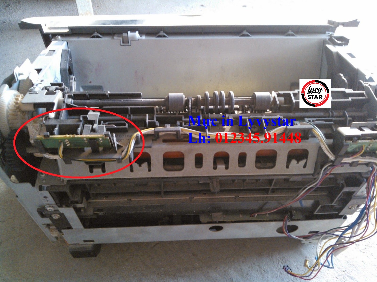 may-in-canon-2900-bị-hu-con-sensor-keo-giay