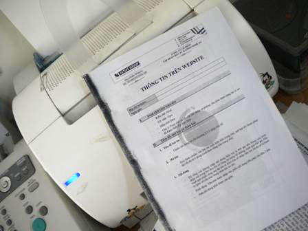 Máy in in bị lem một bên