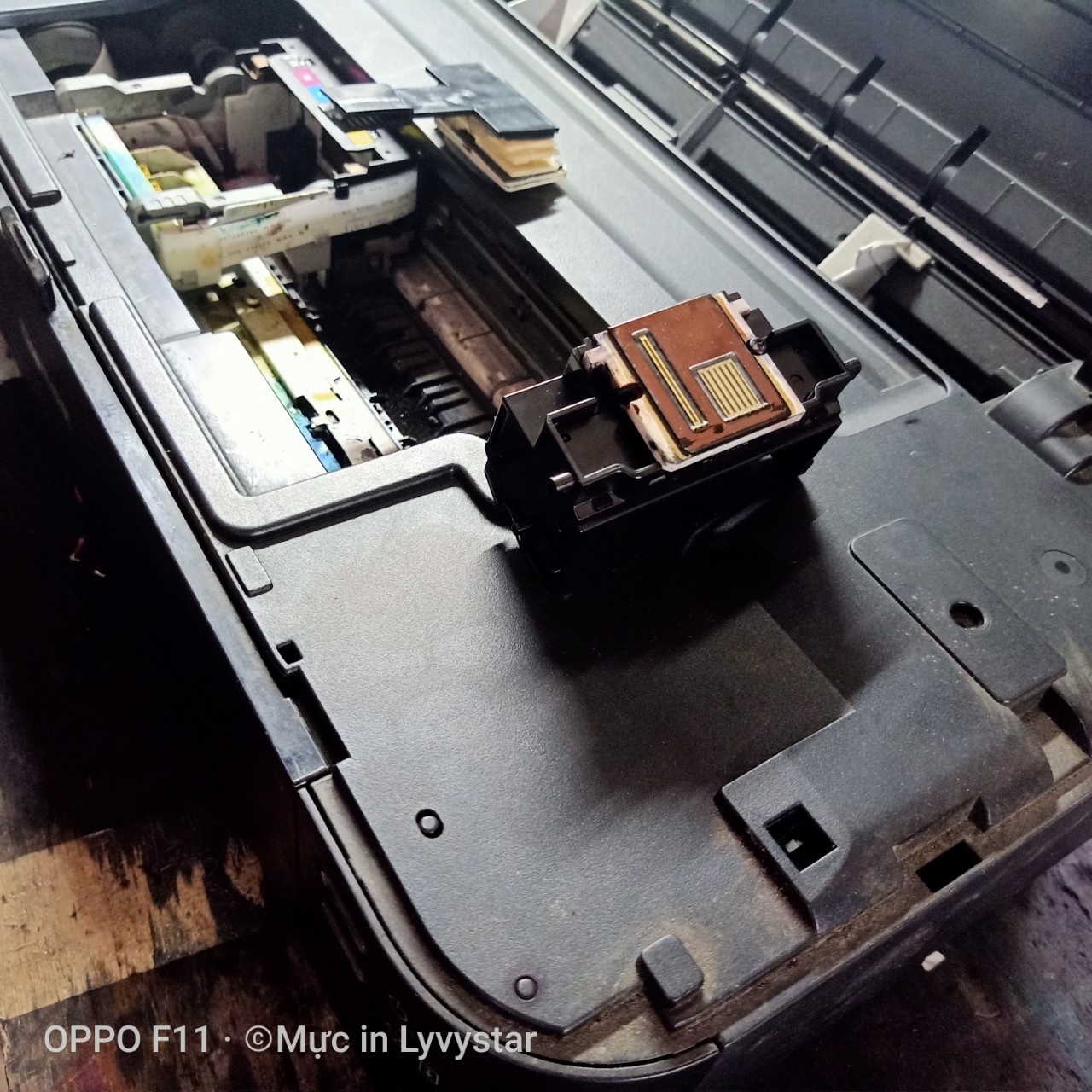 thay-dau-phun-canon-TS707