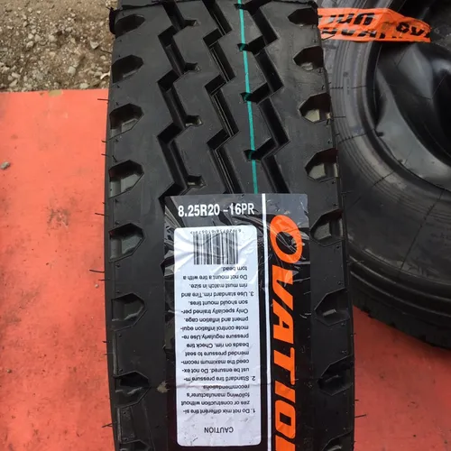 Lốp bố kẽm Ovation gai xuôi 8.25R20 VI-702