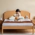 Giường Ngủ Cho Bé Gỗ Sồi Màu Tự Nhiên Đầu Bo Cong Hiện Đại