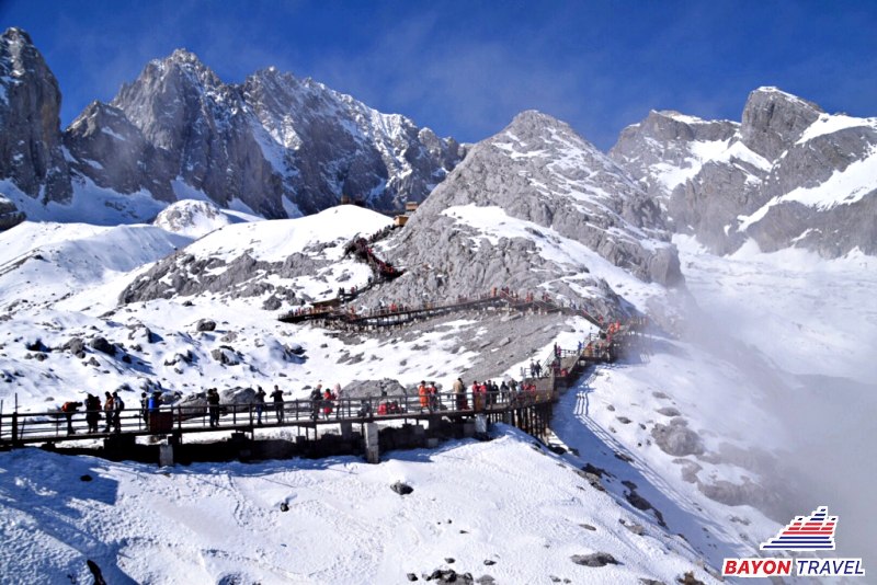 Tham quan Núi Ngọc Long khi du lịch Lệ Giang cổ trấn mùa thu Tham quan Núi Ngọc Long khi du lịch Lệ Giang cổ trấn mùa thu