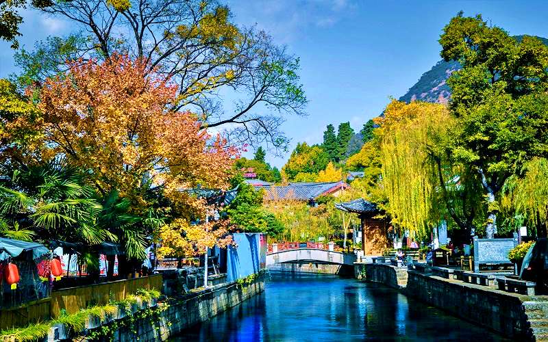 Tiết trời ấm áp khi đi du lịch lệ Giang cổ trấn mùa xuân (Ảnh minh họa) Tiết trời ấm áp khi đi du lịch lệ Giang cổ trấn mùa xuân (Ảnh minh họa)