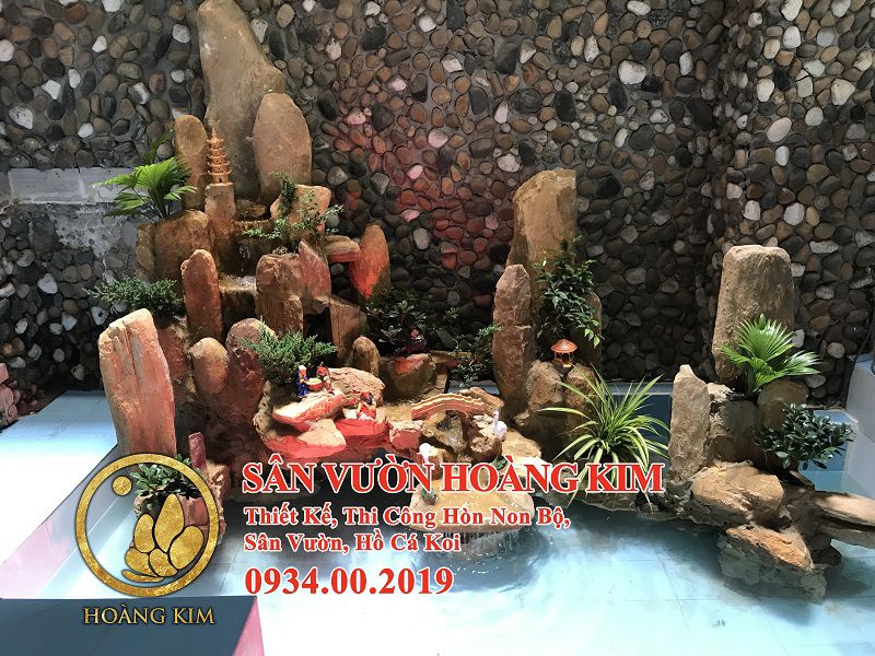 Thi công thiết kế hòn non bộ thác nước bằng đá vàng quận Thủ Đức