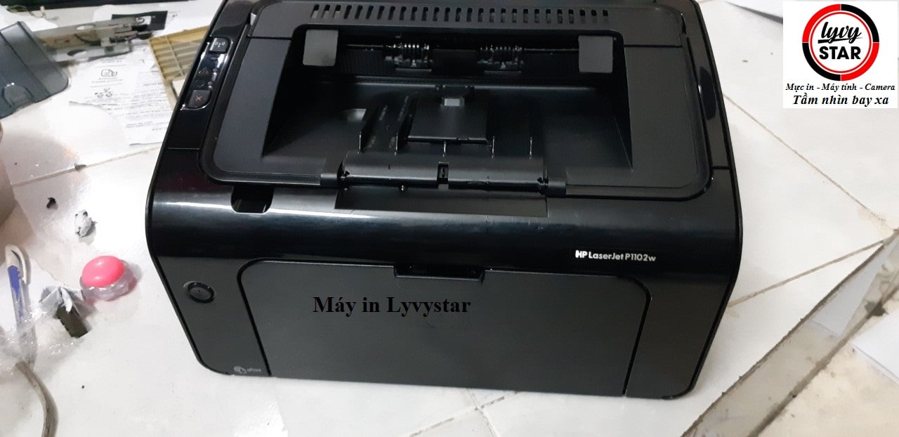 buon-ban-may-in-hp-P1102w-tai-quan-6 Máy in HP Laser Jet P 1102w trắng đen còn rất mới như hình.