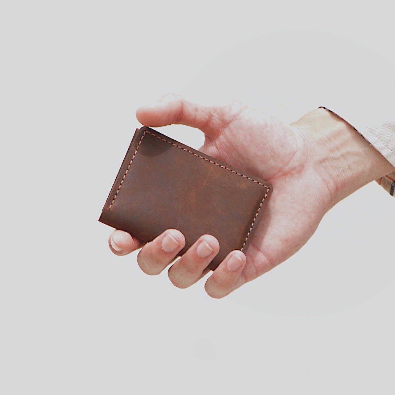 ví da bò cầm tay nam