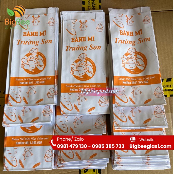 Túi giấy fort trắng đựng bánh mì có in logo theo yêu cầu Túi giấy fort trắng đựng bánh mì có in logo theo yêu cầu
