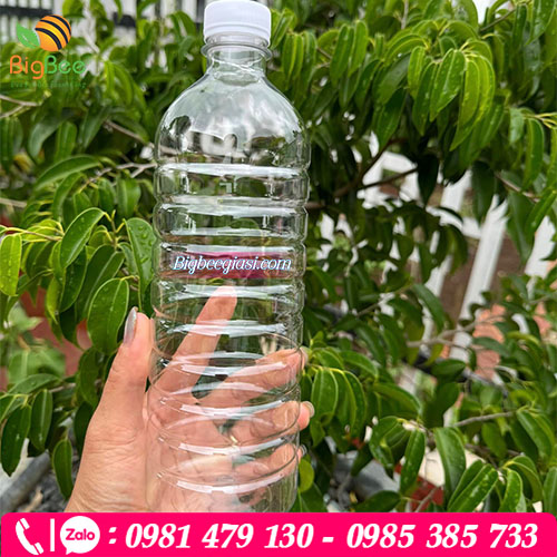 Chai nhựa xoắn 1000ml đựng mật ong nắp trắng Chai nhựa xoắn 1000ml đựng mật ong nắp trắng