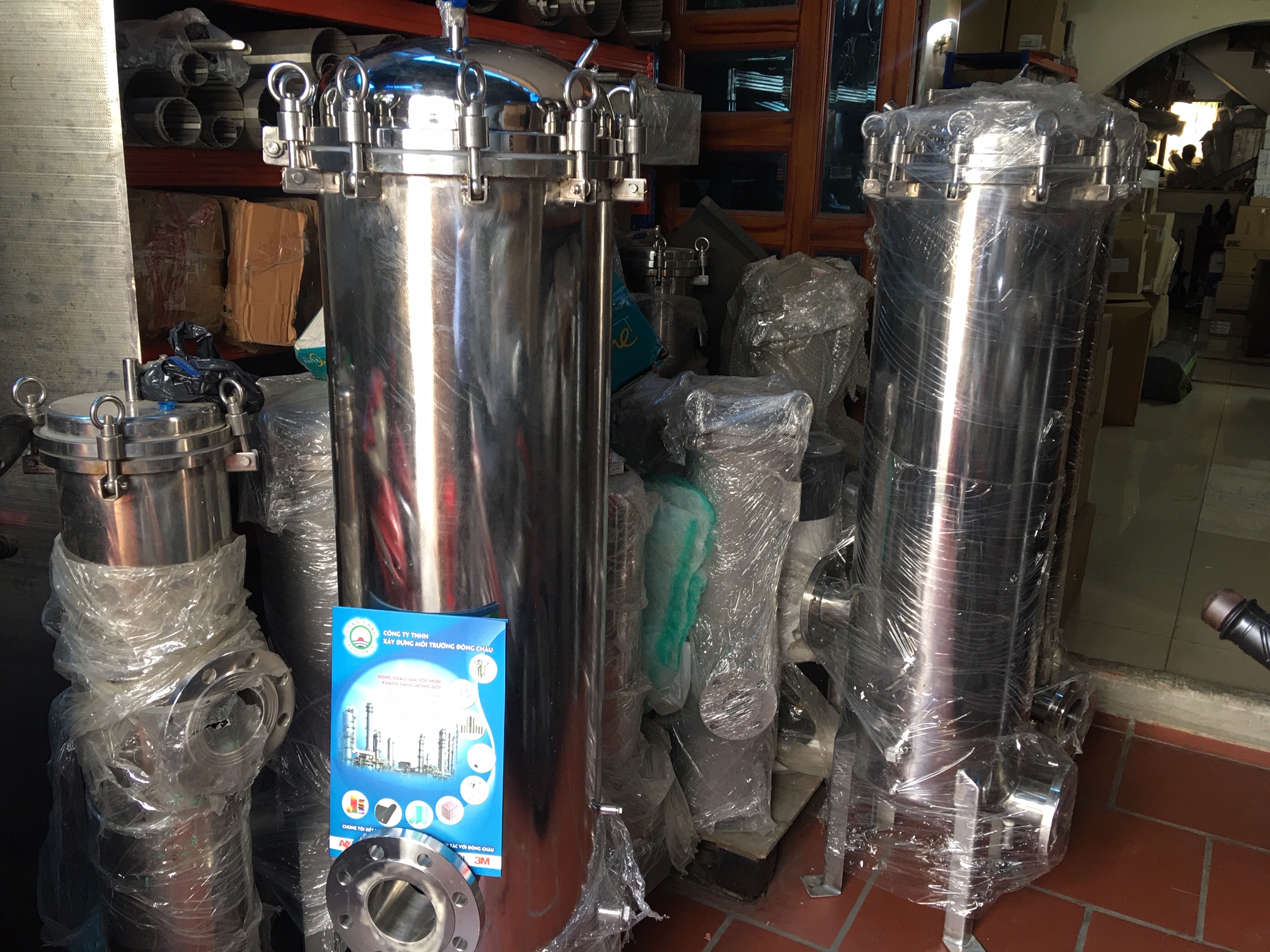 liên hệ đông châu phân phối Bình inox lọc cặn trong sản xuất 15 lõi 40 inch