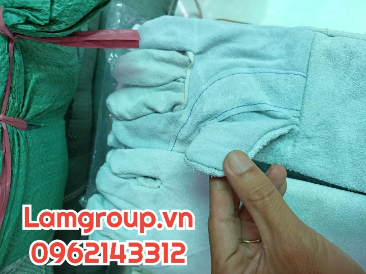 Găng tay vải bạt giá rẻ tại Tp.HCM Găng tay vải bạt giá rẻ tại Tp.HCM