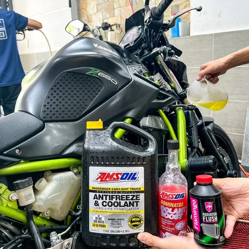 PHỤ GIA NƯỚC MÁT AMSOIL DOMINATOR ® Coolant Boost - 16 oz