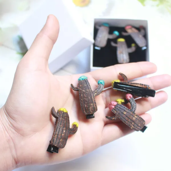 KẸP TÓC DỪA XƯƠNG RỒNG CUTE ( 1 KẸP )