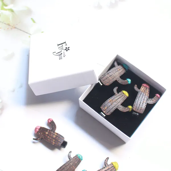 KẸP TÓC DỪA XƯƠNG RỒNG CUTE ( 1 KẸP )
