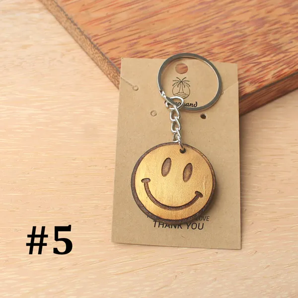 MÓC KHÓA MẶT CƯỜI - NHẬN KHẮC TÊN MẶT SAU