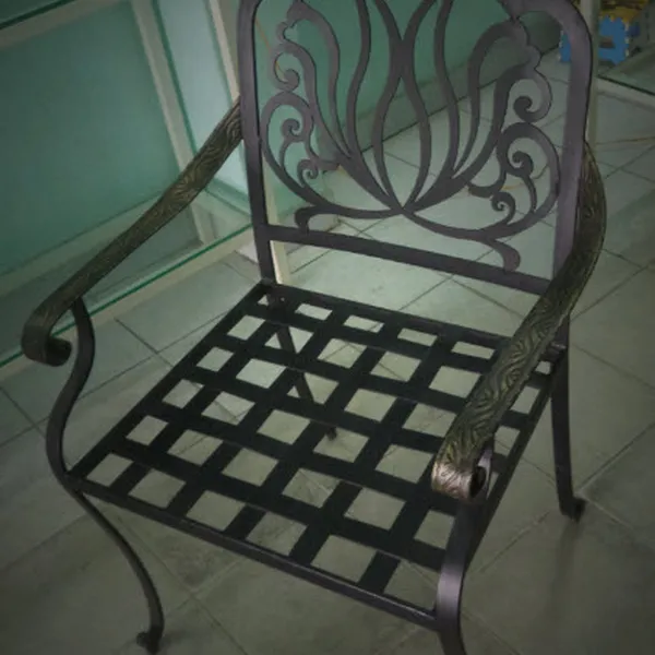 Artistic wrought iron chair with CNC cut patterns and elegant for the welcome spring