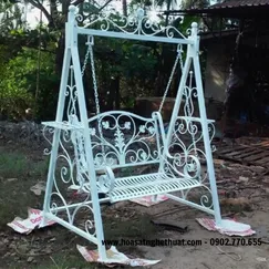 Bending iron rocking chair art