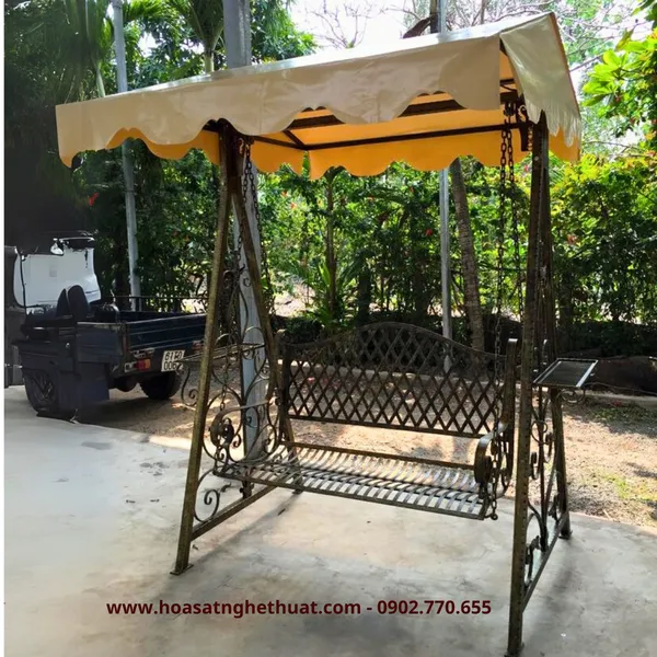 Samples of wrought iron swing beautiful art with antique gold tones
