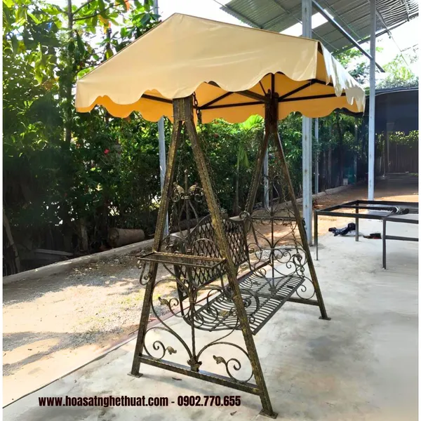 Samples of wrought iron swing beautiful art with antique gold tones