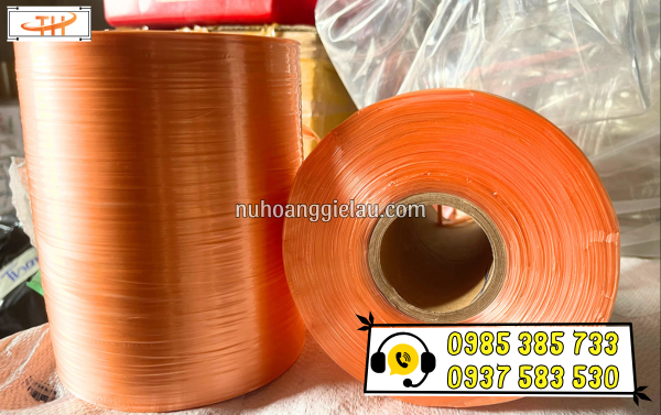cuộn dây nilon quấn máy màu cam trọng lượng 2kg cuộn dây nilon quấn máy màu cam trọng lượng 2kg