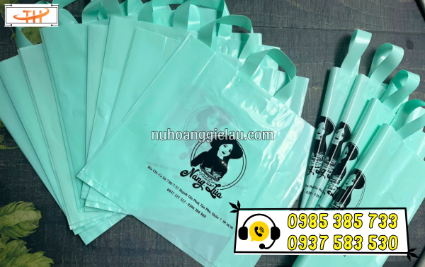 Túi hột xoài ép quai in thương hiệu Túi hột xoài ép quai in hoa văn