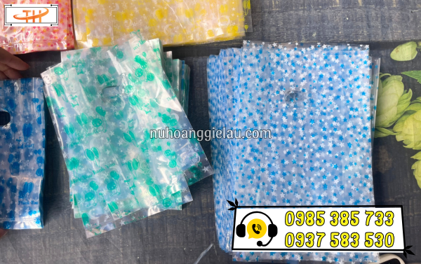 Túi hột xoài trong suốt in hoa nhí sẵn Túi hột xoài trong suốt in hoa nhí sẵn