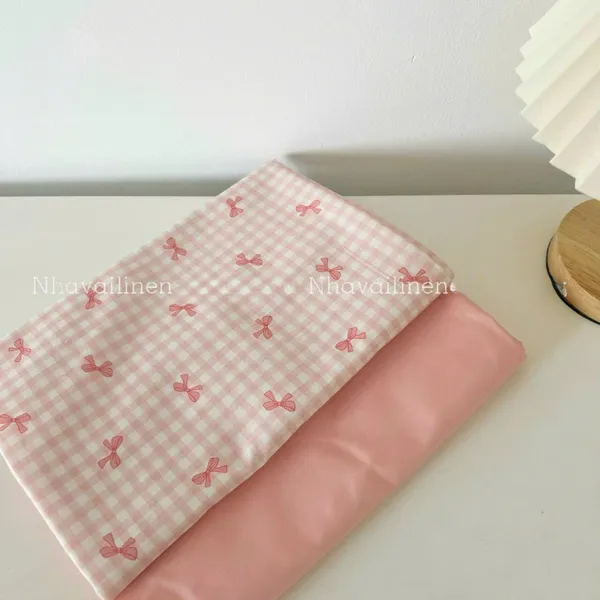 Vải cotton cao cấp hoạ tiết  caro nơ hồng