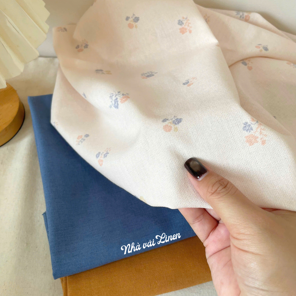 Vải linen bột hoa cam xanh