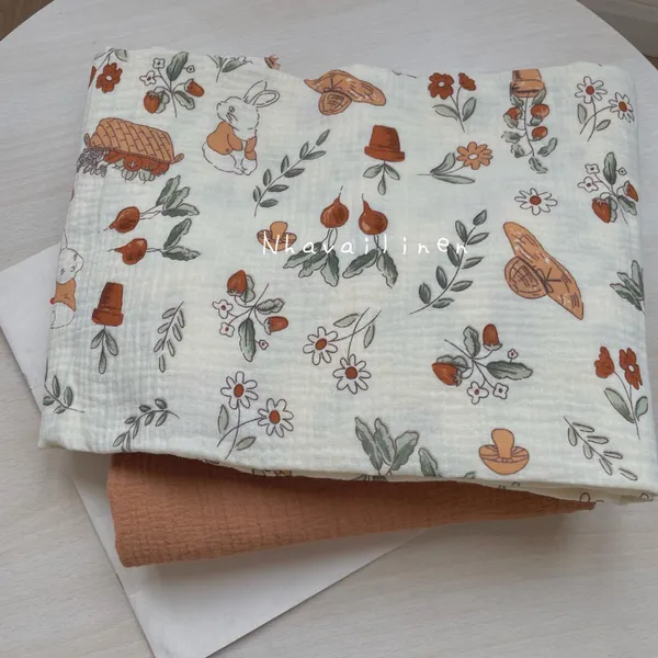 Vải xô muslin cao cấp 2 lớp hoạ tiết thỏ củ cải nâu